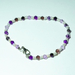 Βραχιόλι με μωβ και άσπρες ακρυλικές χάντρες